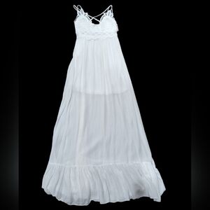 Vine and Valley white dress with lace detail.